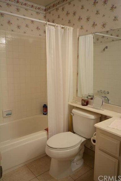 Hall/Family Bath, With shower over Tub.