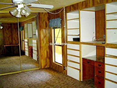 Property Photo. MASTER W/BUILT IN CABINETS.