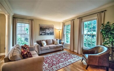 The fabulous family room  features gorgeous hardwo