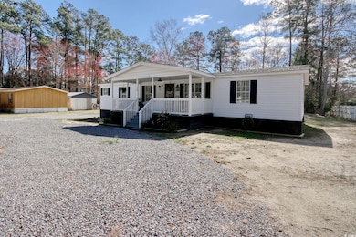 Manufactured / mobile home featuring covered porch