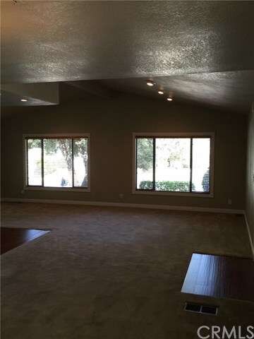 Living room with Recessed lighting, beveled glass 
