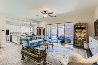Enormous Great Room with Expansive Sliders Leading