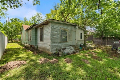 View of property exterior with a fenced backyard