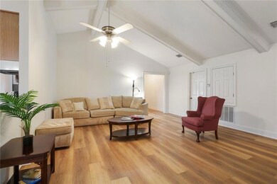 Cathedral ceiling make this den look sophisticated