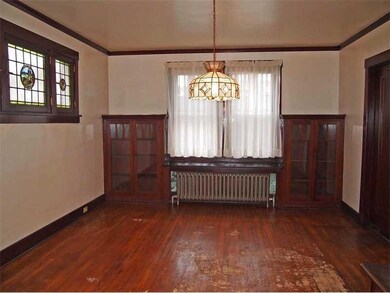 Dining Room. Original built-ins, woodwork and stai
