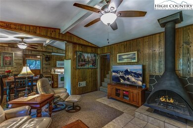 Living room opens to dining area, and kitchen