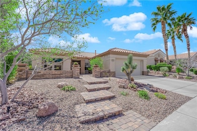 Mediterranean / spanish-style home featuring drive