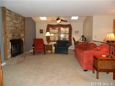Family Room. Family room offers stone faced wood b