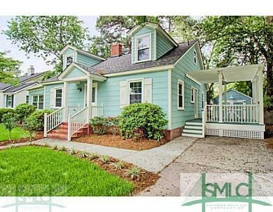 Exterior Front. Large Deck with Pergola