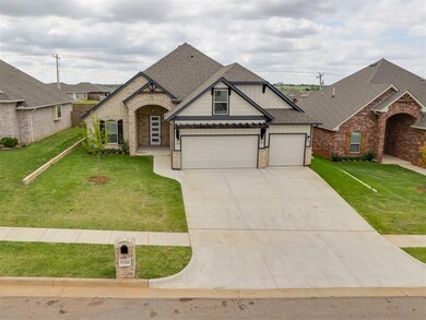 View of front facade featuring a front lawn and a 