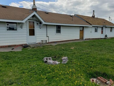 The back of the two cabins.  Each with kitchen, 3/