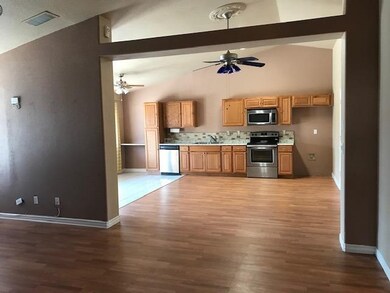 Living Room is open to Kitchen