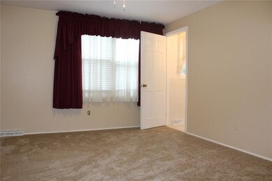 The master bedroom boasts double closets and a pri