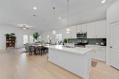 Kitchen with stainless steel appliances, lofted c