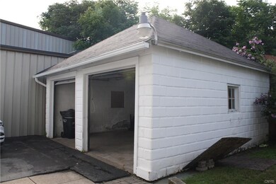Paved Drive with 2 Car Detached Garage and 1 Opene