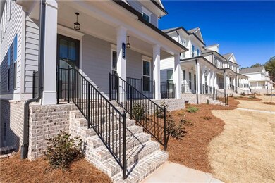 arge windows with crisp white trim let in plenty of natural light, and a wooden front door with a glass panel adds warmth and charm.Photo not of actual home, but previously built TPG home. For representation purposes only.