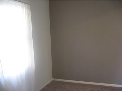 This room is off the Family Room and would make a great play room or man cave