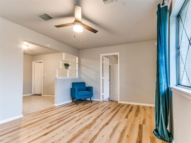 ANOTHER VIEW OF LIVING ROOM OPEN TO KITCHEN