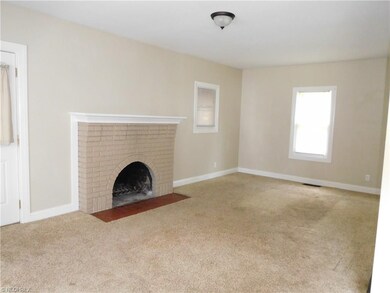 large family room with fireplace