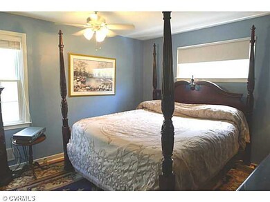 Master Bedroom - The Master has a nicely sized closet and it's light and bright. It's got it's own sink and toilet which also opens to the huge hall bath.