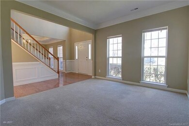 LIVING ROOM: The living room has open views to the
