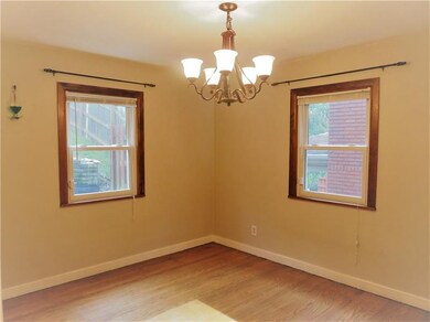 Original hardwood flooring in dinning room.