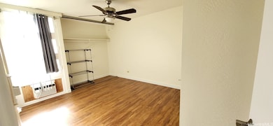 2nd bedroom with fan and A/C