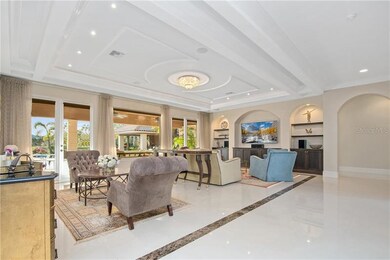 Great Room opens to Covered Lanai sitting area