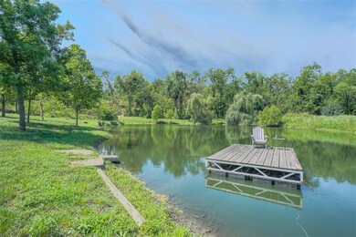 Stocked pond with floating dock provides lovely la