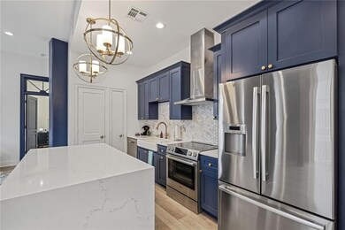 Kitchen with counter seating at island