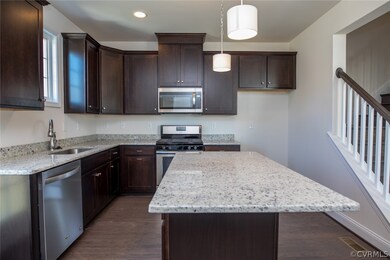 SS appliances include built-in microwave.