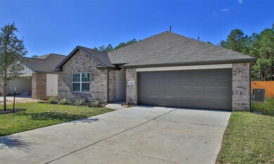 30391 Castle Stuart Ct, Cleveland, TX 77327 - photo 2