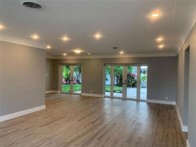 LIVING ROOM FACING BACKYARD
