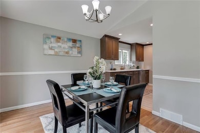 Dining Area with New Chandelier and Chair Rail