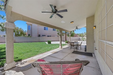 View of patio / terrace featuring a ceiling fan an