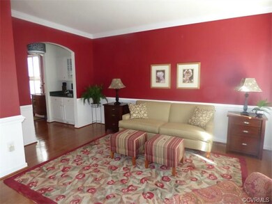Living Room open to Butlers Pantry leading to the 