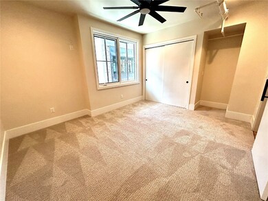 Unfurnished bedroom with carpet floors, a closet,