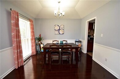 Dining Room with Wood Flooring