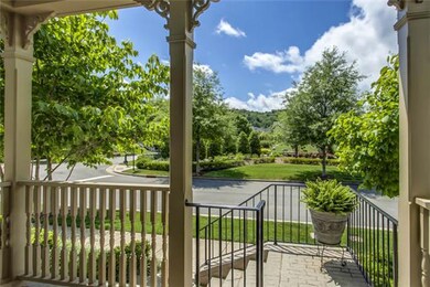 View from front porch of beautiful park across the street.  Very low traffic street.  3 blocks from Residents club, pools, parks, tennis and playground