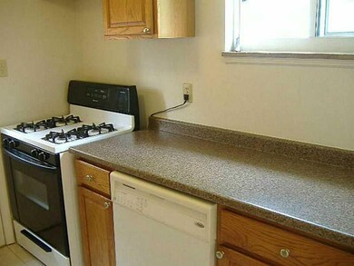 Kitchen. Kitchen exits to wrap around rear deck