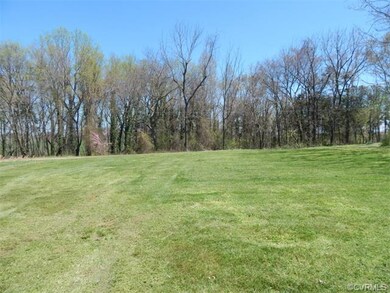 Wooded area to right of property that goes to cree