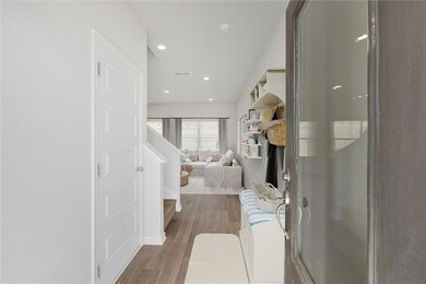 Bedroom with wood finished floors, recessed lighting, and baseboards