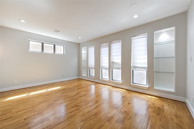 Flooded with natural light from oversized windows,