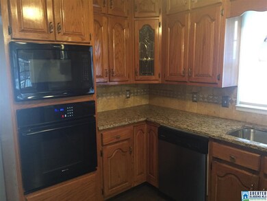 Large renovated kitchen offers built-in appliances