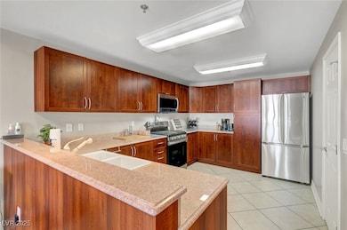 Kitchen with appliances with stainless steel finis