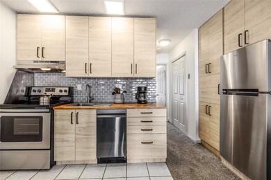 Kitchen featuring appliances with stainless steel