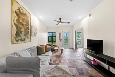 Living area with baseboards, recessed lighting, s