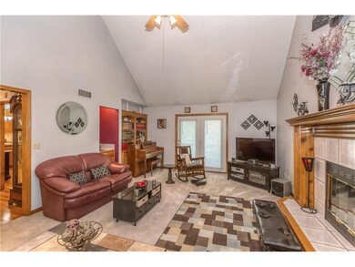 LIVING ROOM WITH FIREPLACE, WET BAR, BUILT IN BOOK