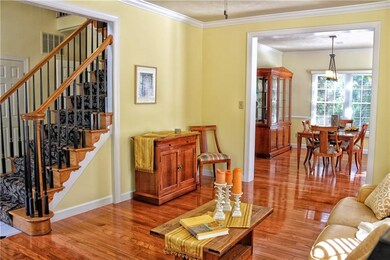 The living room opens into the dining room.