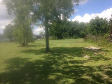 Exterior Front. On the same property line on Legio